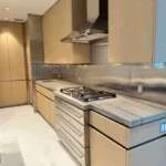 Furniture wrap of a kitchen with sleek cabinetry.