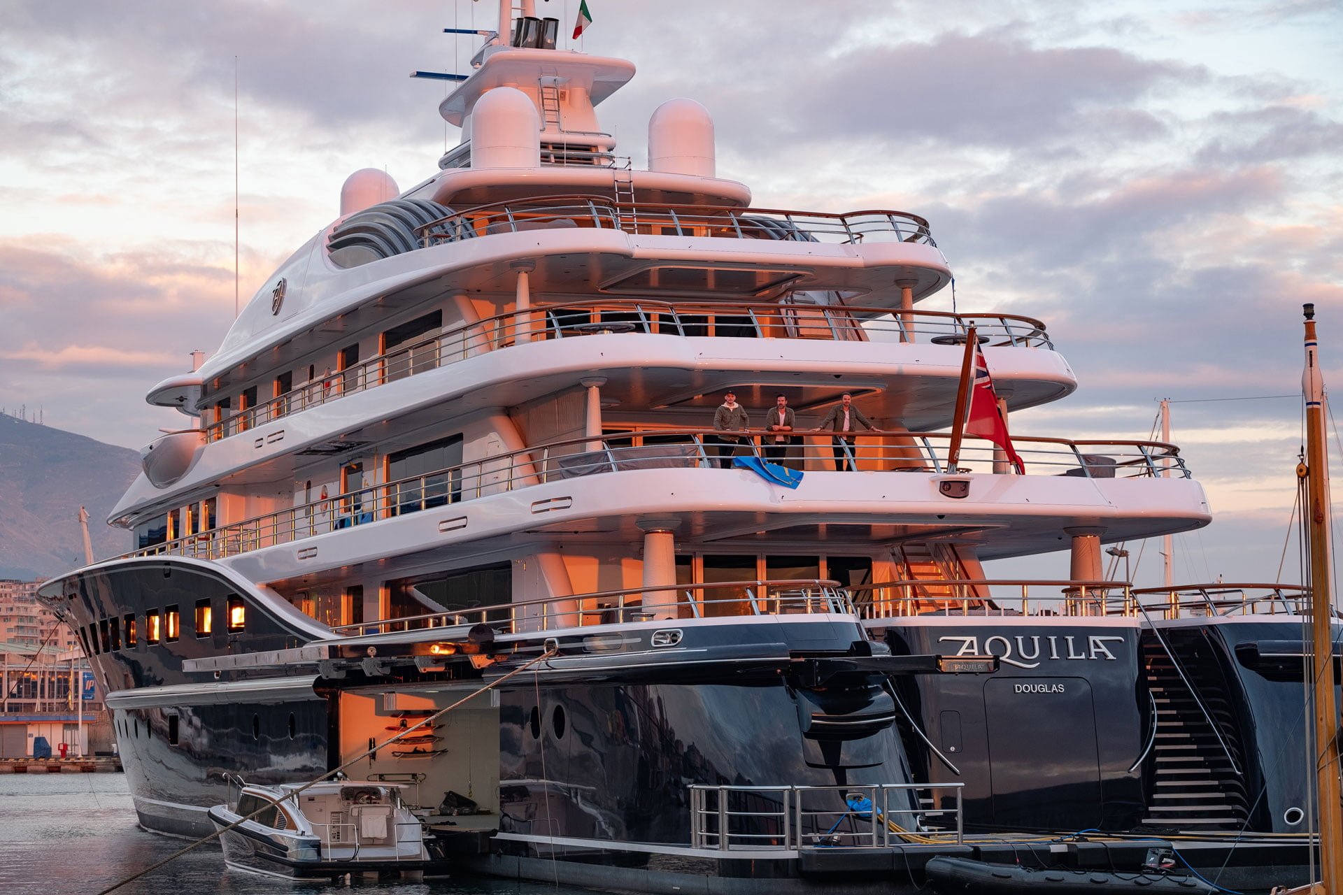 Boat wrap cost at the top of the scale: the 2wrap.com crew aboard the 85.6 m motor yacht Aquila in Genoa