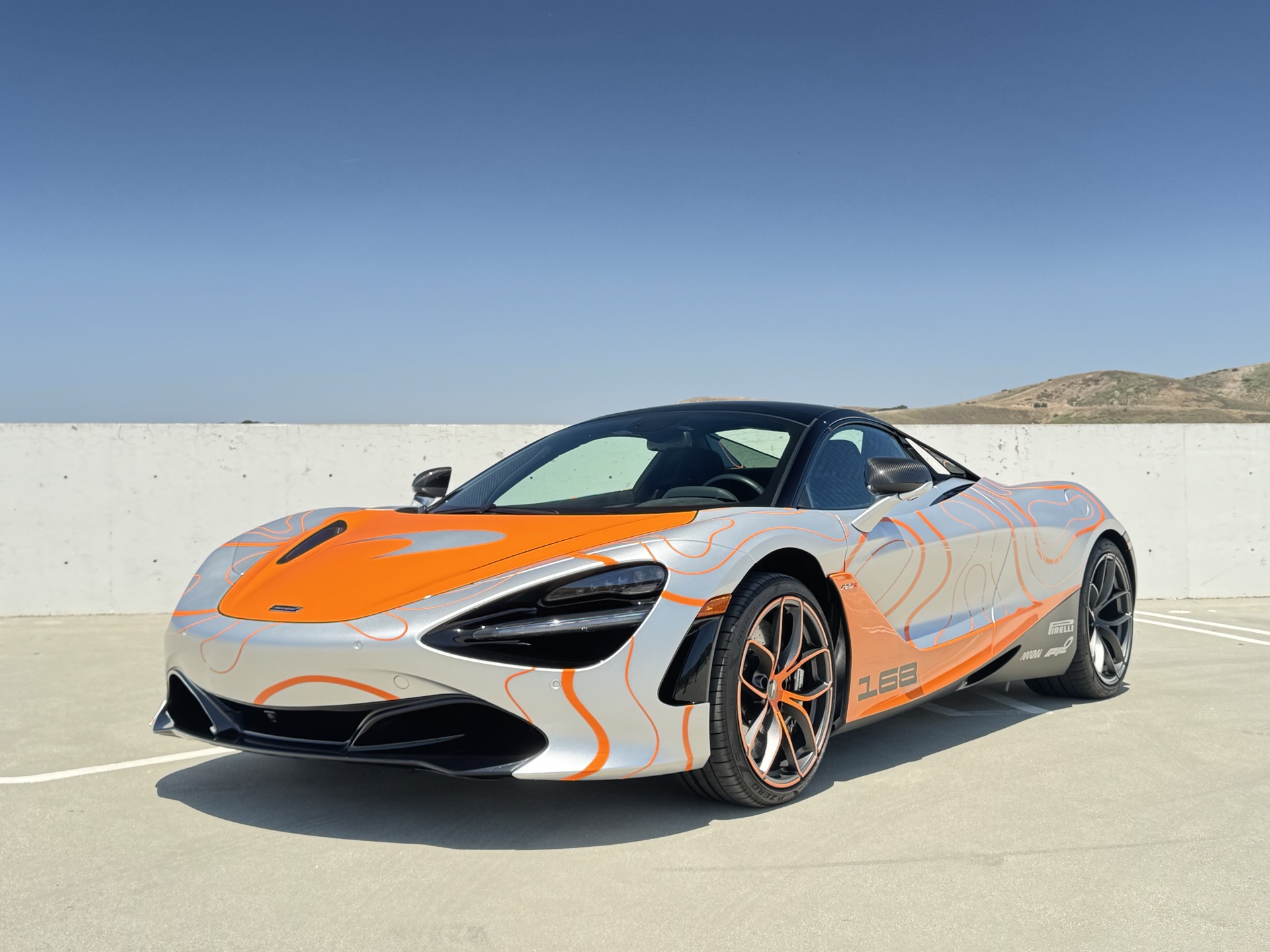 Paint protection film cost on a McLaren 720S finished in matte PPF with orange contour graphics at our Westlake Village studio